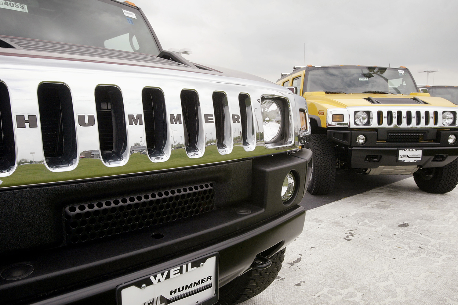 Hummer H2 SUVs in a dealer lot in 2004