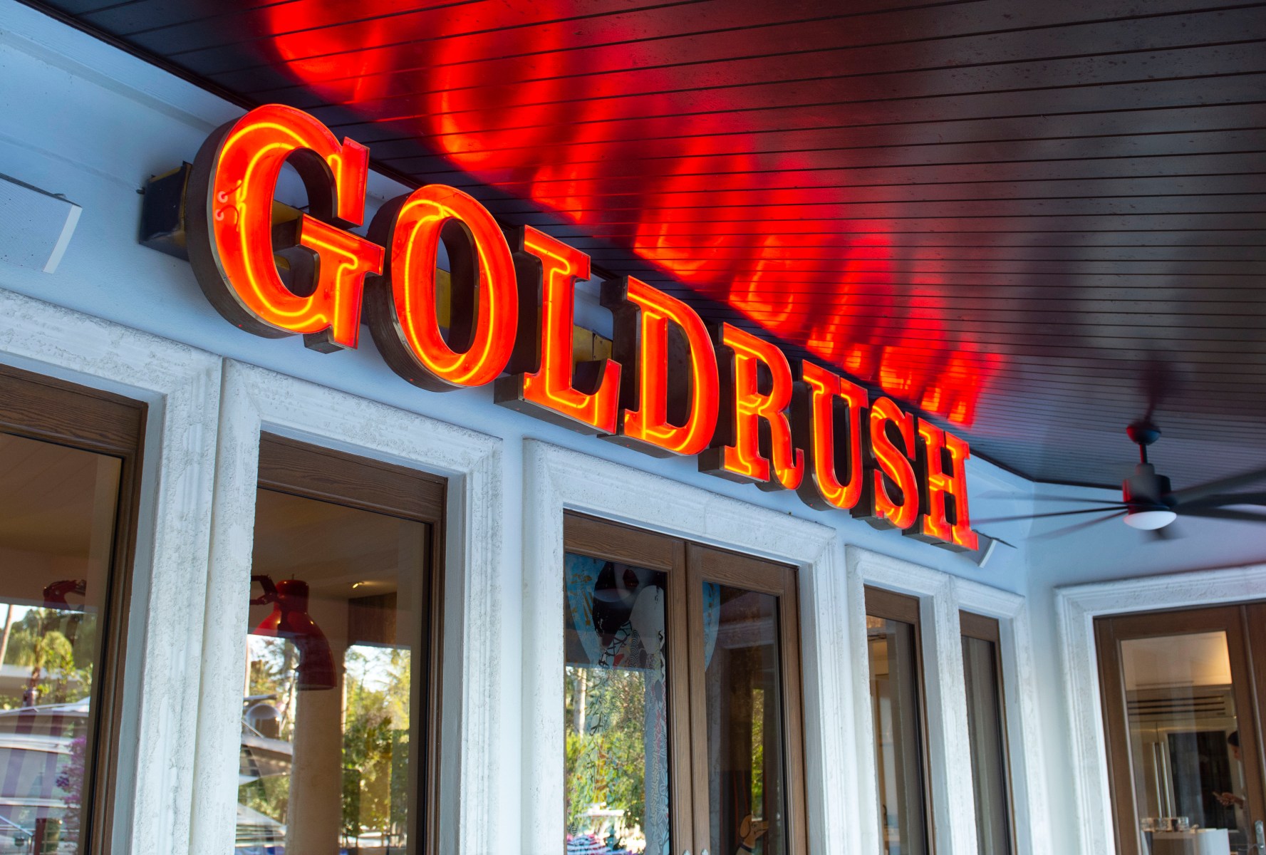 An authentic sign from a downtown Miami strip club of the same name adorns the patio above Grutman’s long sugarwood table.