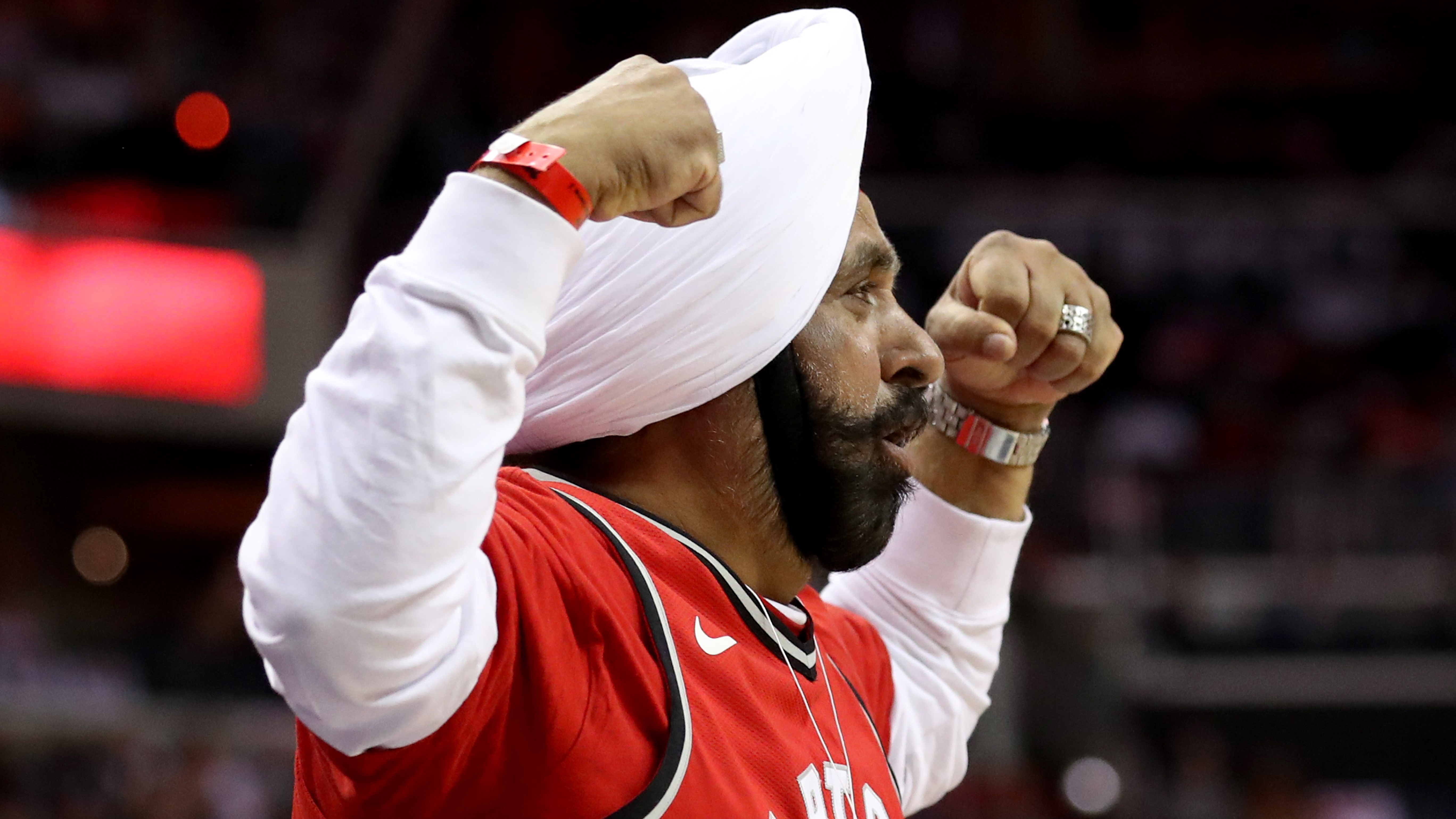 Nav Bhatia celebrates Raptors basket