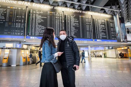 Passengers with face masks pictured at Frankfurt Airport on March 12, 2020 in Frankfurt, Germany. (Photo by Thomas Lohnes/Getty Images)