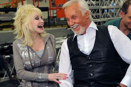 Dolly Parton and Kenny Rogers backstage at the Kenny Rogers: The First 50 Years show at the MGM Grand at Foxwoods on April 10, 2010 in Ledyard Center, Connecticut. (Photo by Rick Diamond/Getty Images)