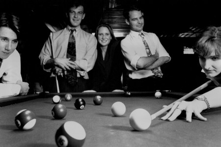 Suits playing pool, the once working class game has been taken over by Yuppies...Playing at Metropole Hotel, Cremorne, L to R... Adrian Fisk, Cameron Bryant, Cameron, Nicole Lunday, Stuart Mitchell, and Margot Clarke.. October 14, 1993. (Photo by Paul Jones/Fairfax Media via Getty Images).