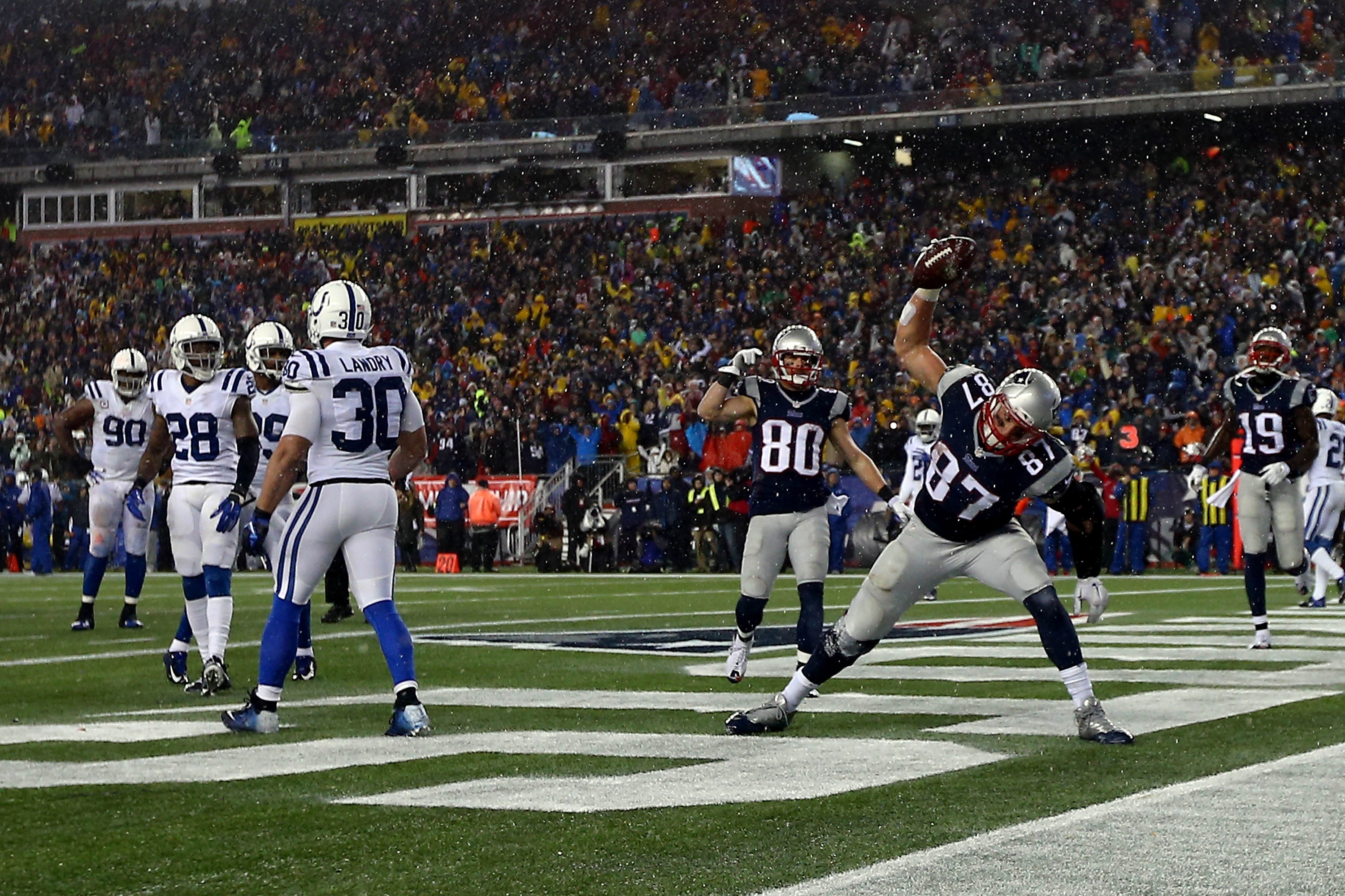 Rob Gronkowski spikes the ball after a touchdown