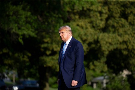 President Donald Trump walking outside