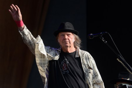 Neil Young performs on stage in Hyde Park on July 12, 2019 in London, England