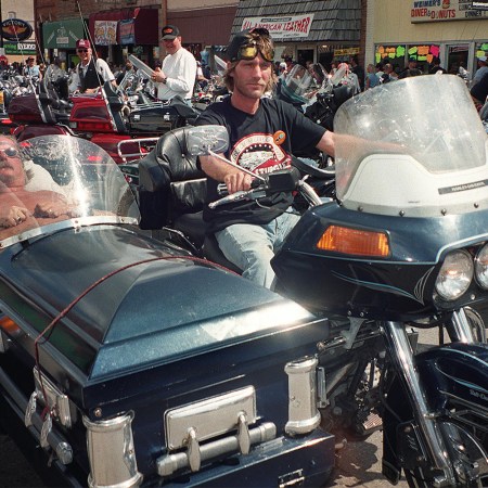 Two bikers at Sturgis in South Dakota in 2001, one in a coffin sidecar