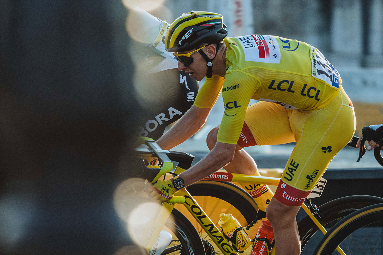 Tadej Pogačar racing the Tour de France while wearing the Breitling Endurance Pro watch