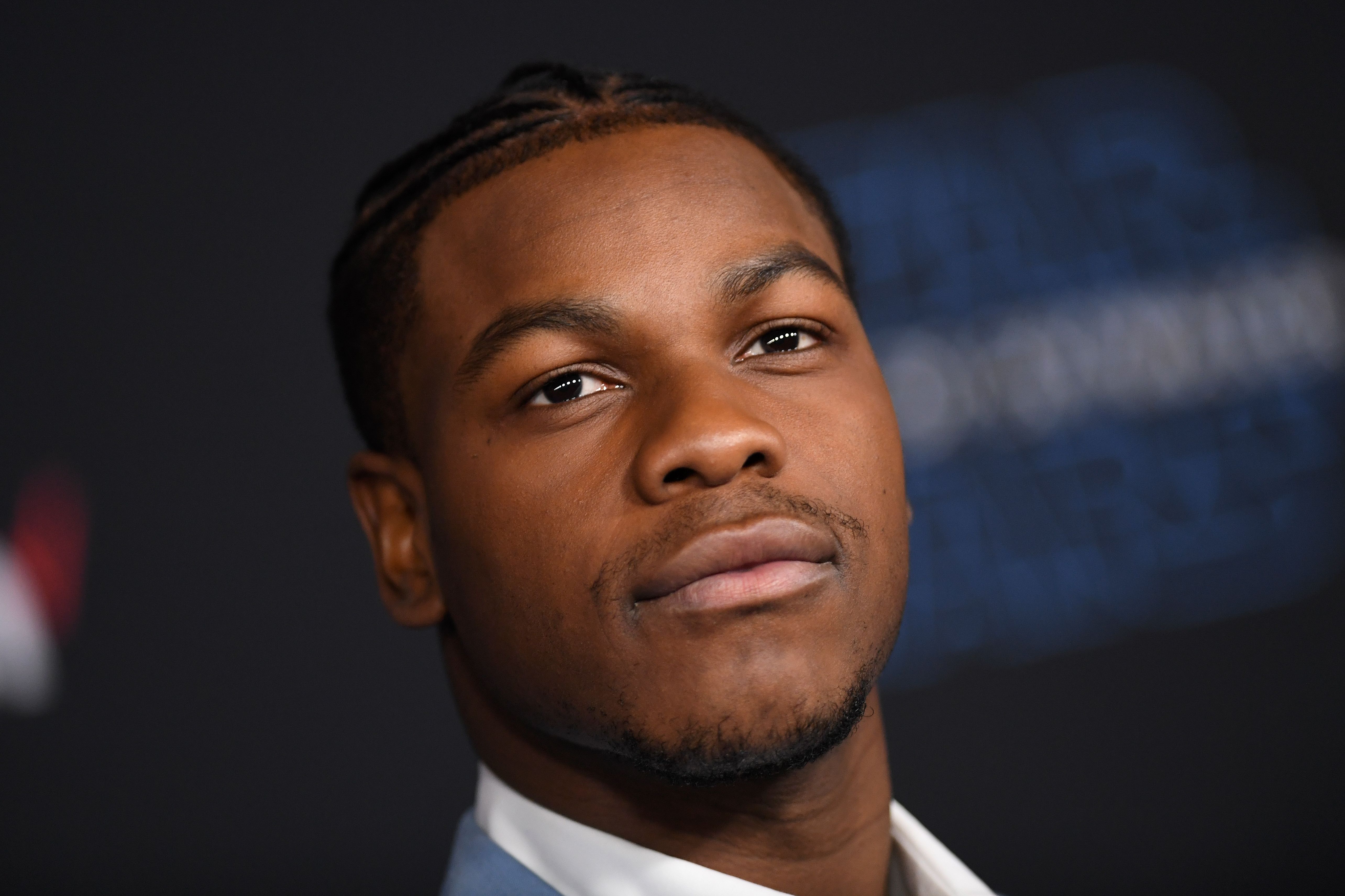 English actor John Boyega arrives for the world premiere of Disney's "Star Wars: Rise of Skywalker" at the TCL Chinese Theatre in Hollywood, California on December 16, 2019. (Photo by VALERIE MACON / AFP) (Photo by VALERIE MACON/AFP via Getty Images)