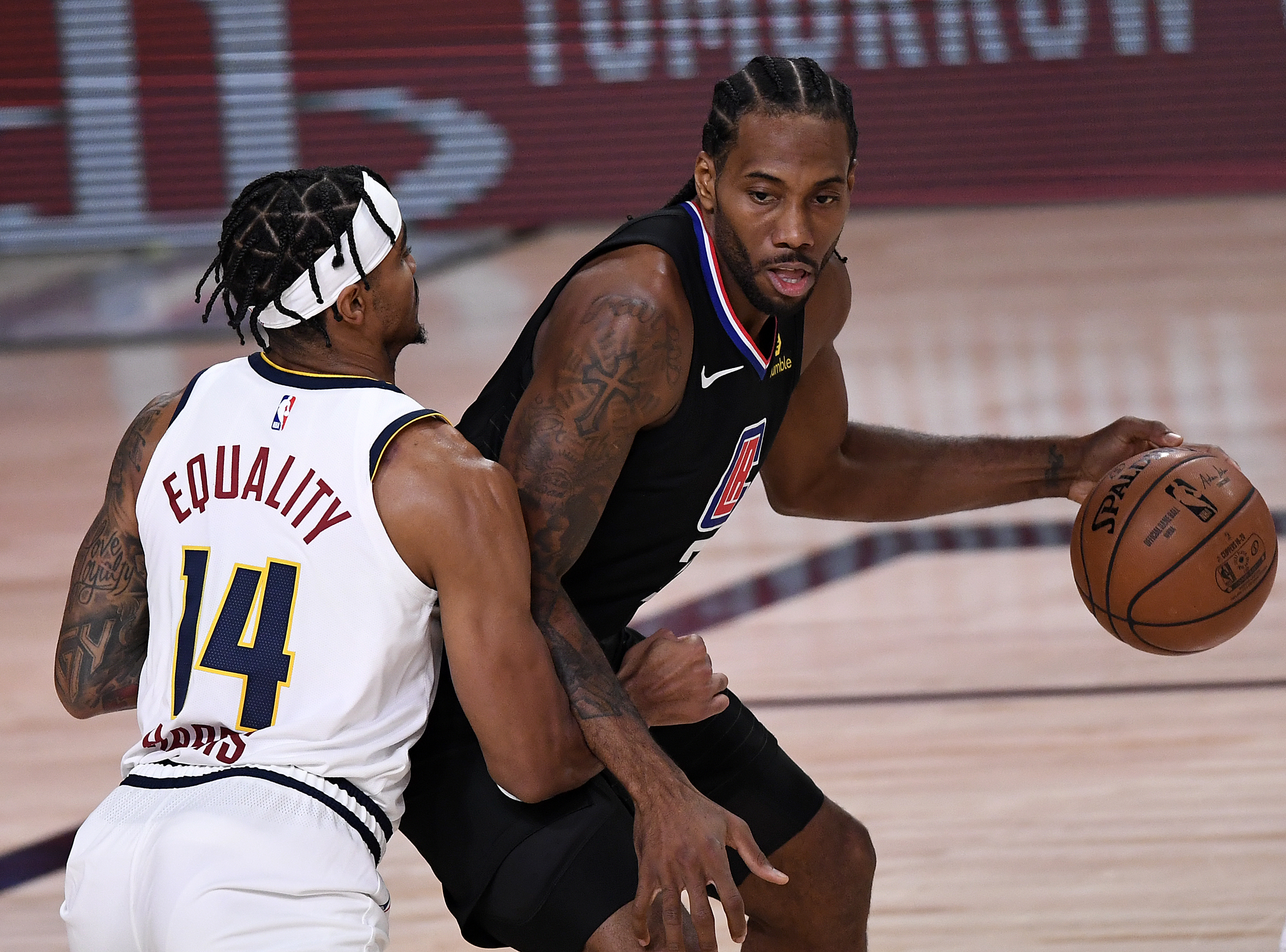 Kawhi Leonard backs down Gary Harris