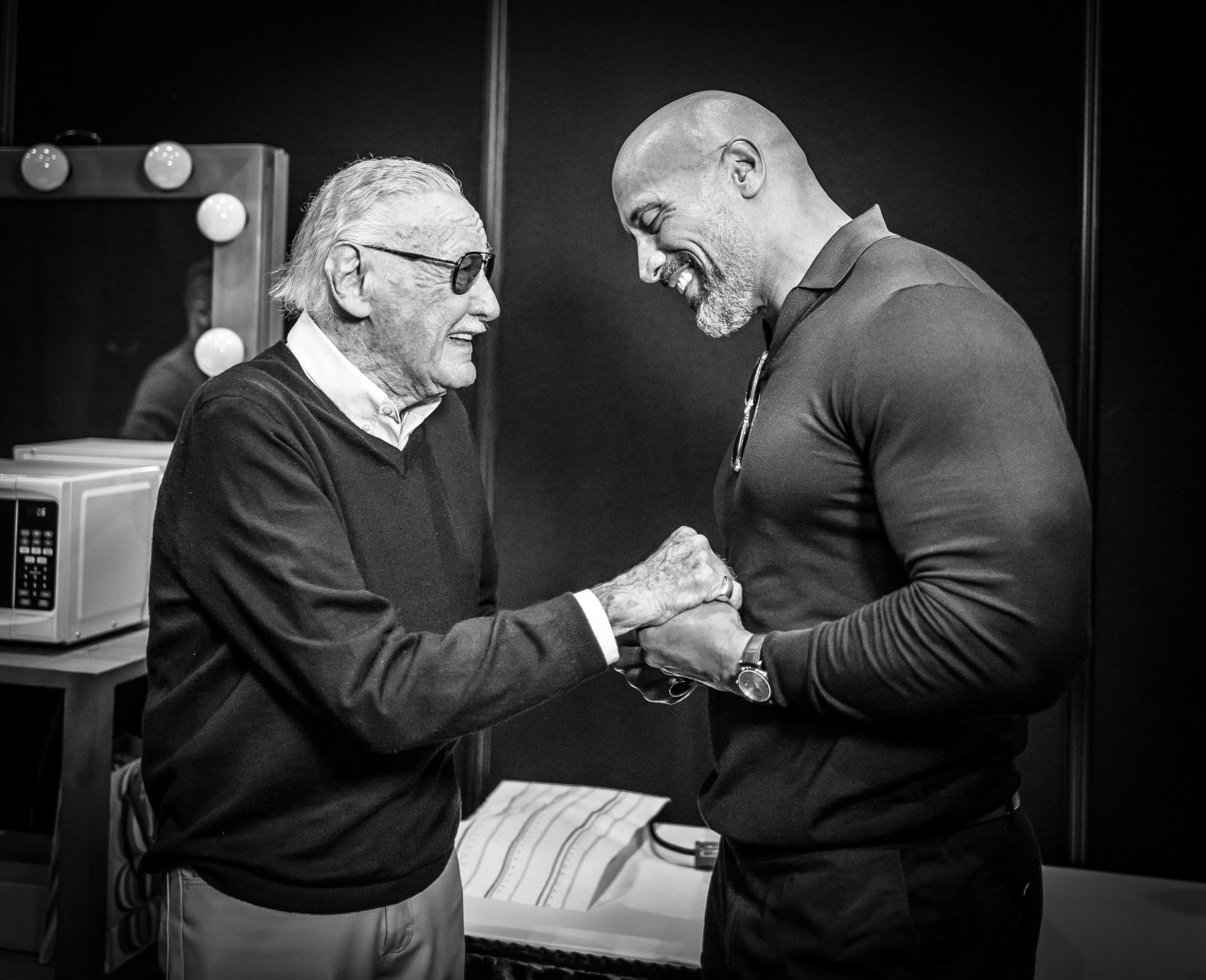 “This is one of my favorite shots and I've always really loved the story behind it,” Garcia says. “When Dwayne first got into the business, there were many people that believed in him, but Stan Lee was one at the forefront. When Dwayne first came to Hollywood, Stan greeted him with open arms and really believed in DJ. He just felt that this guy had something to offer the business. Fast-forward, and now Dwayne is the star he is. We were getting ready to release some never-before-seen footage of <em>Rampage</em> at Stan Lee's Comic-Con in LA. This was the first time they had seen each other for some time. I know DJ well and I love in this shot that it's so clear how humbled he is because Stan is just heaping praise onto him. He was telling him how proud he was of him and how he always knew that this is what he was meant to do. I think you see the warmth between them had come full circle.”