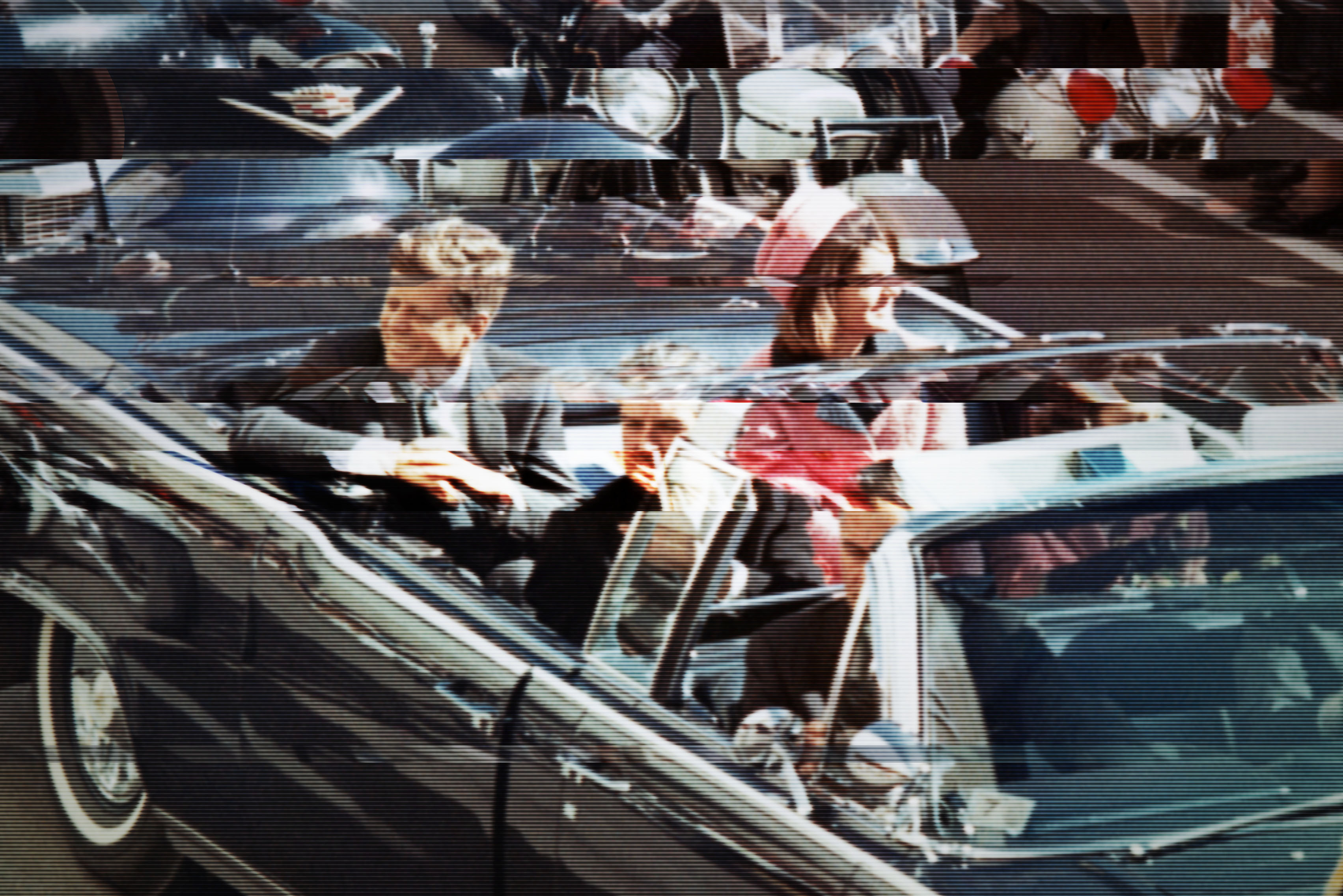 Kennedys Riding in Dallas Motorcade