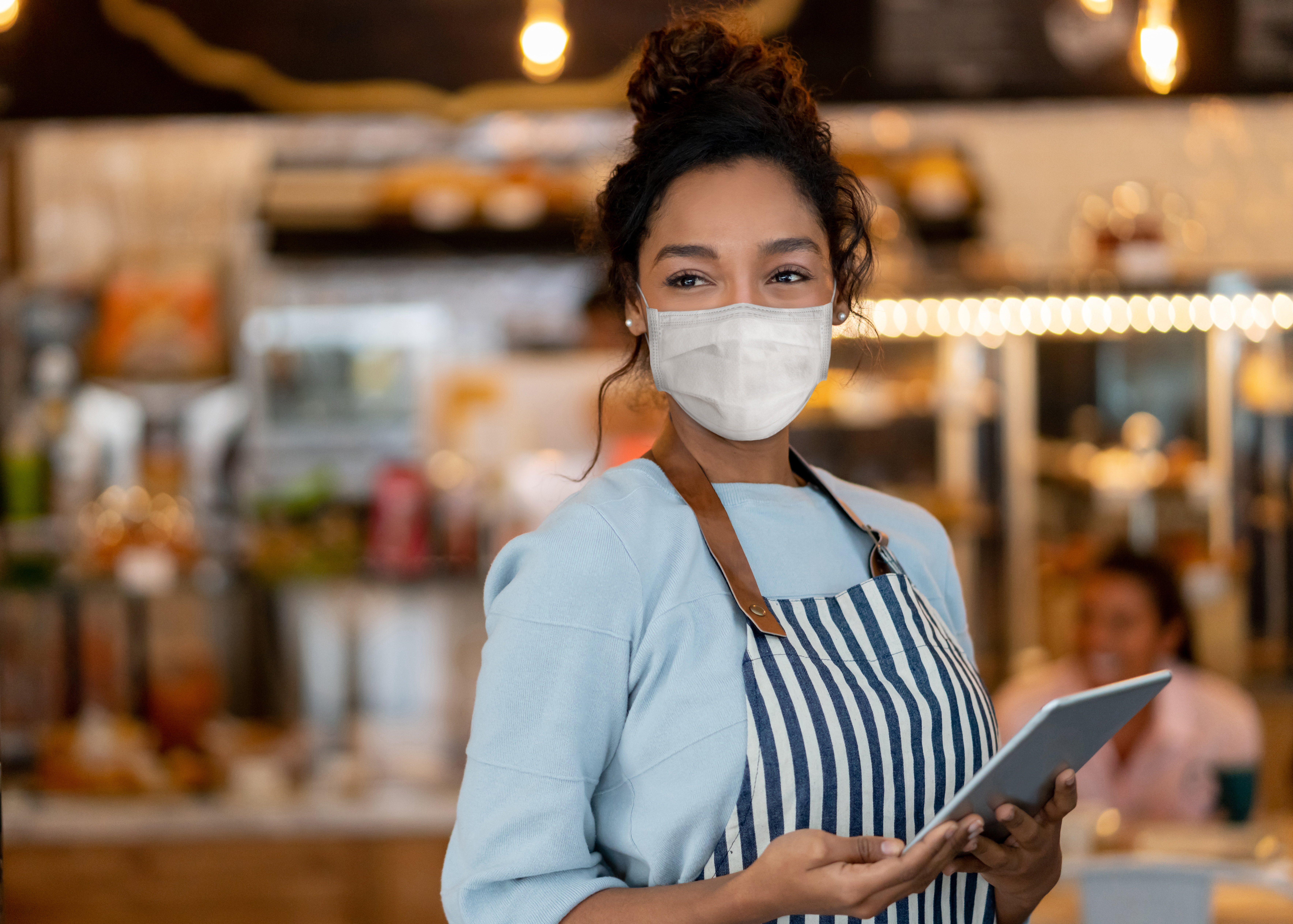 restaurant server wearing a mask