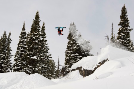 Travis Rice jumps over Pine Island during day 1 qualifiers of the Natural Selection Tour at Jackson Hole Mountain Resort in Jackson, Wyoming, USA, on 16 February, 2021