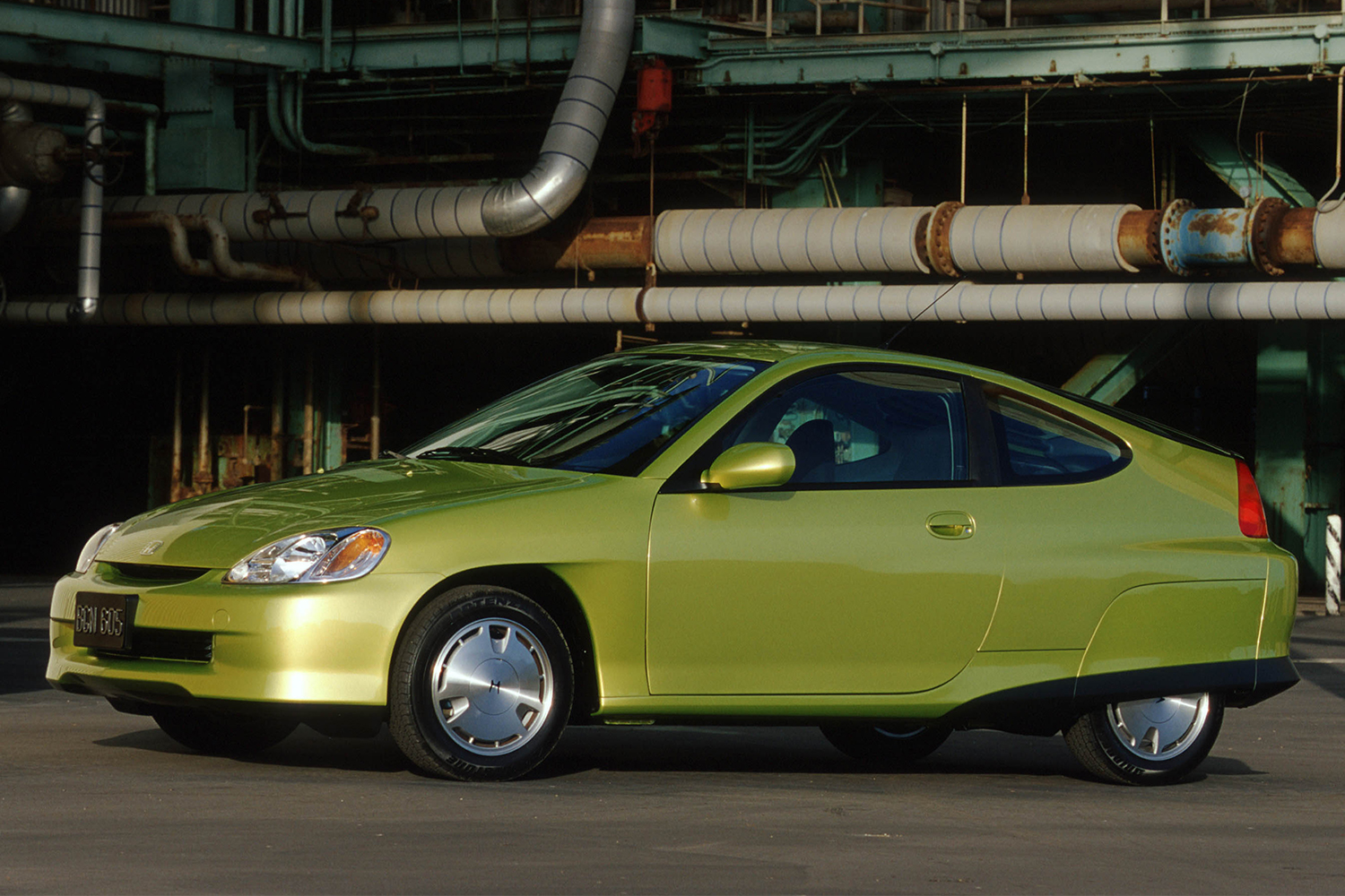 2000 Honda Insight hybrid car in the color citrus yellow metallic