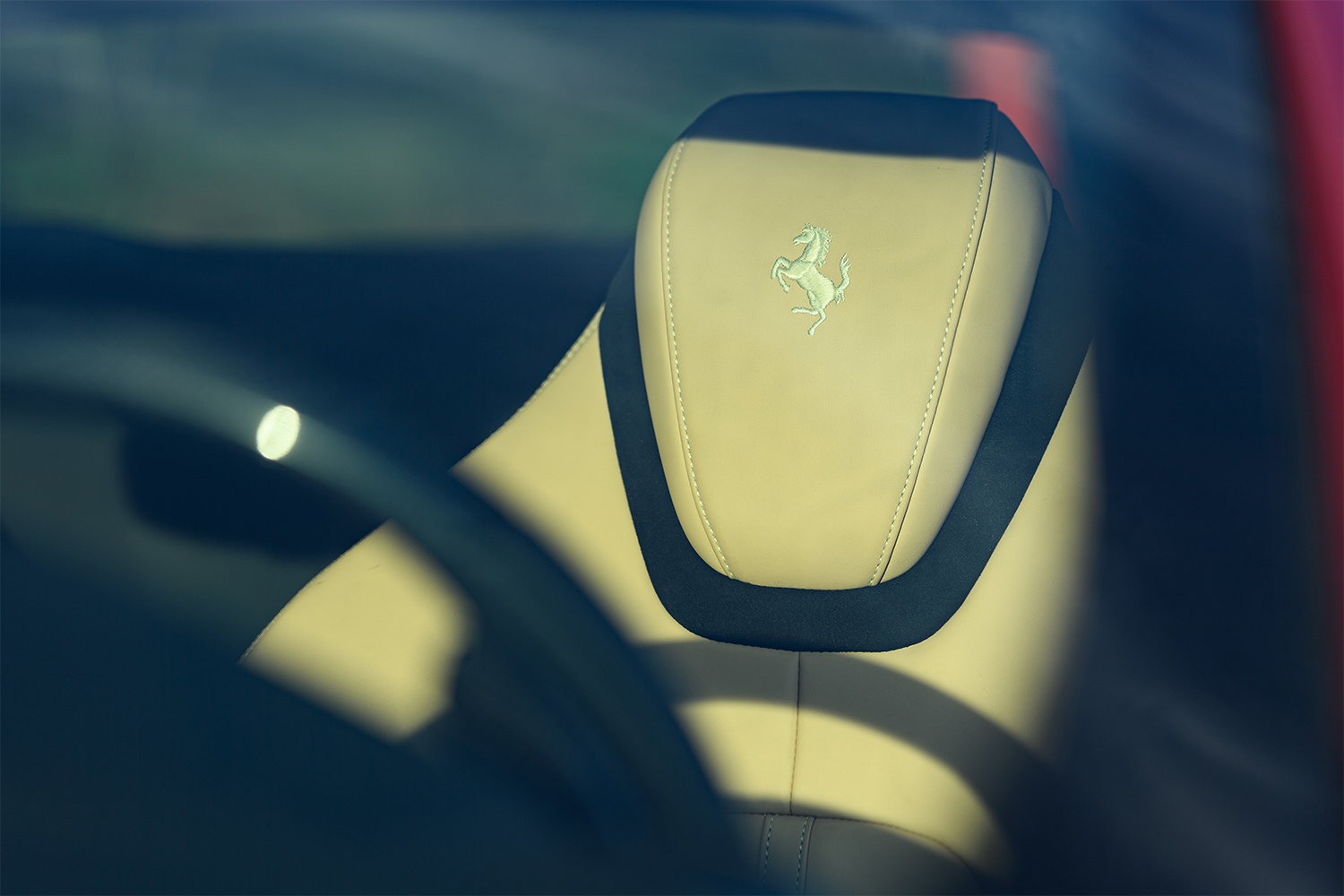 Ferrari Prancing Horse logo on the headrest of the Roma