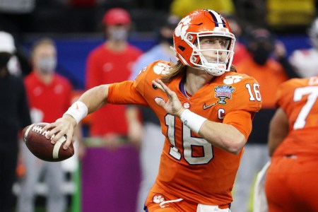 Trevor Lawrence of the Clemson Tigers looks to pass in the second half against the Ohio State Buckeyes during the College Football Playoff semifinal game at the Allstate Sugar Bowl at Mercedes-Benz Superdome on January 01, 2021 in New Orleans, Louisiana.