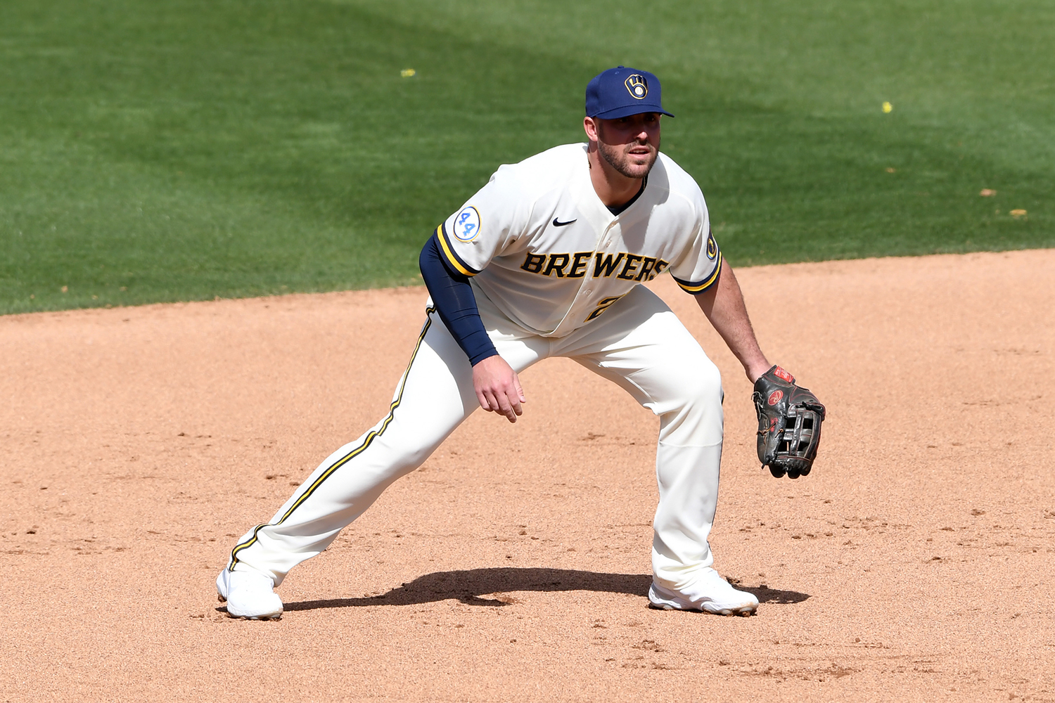 Travis Shaw #21 of the the Milwaukee Brewers gets ready to make a play against the Cleveland Indians during a spring training