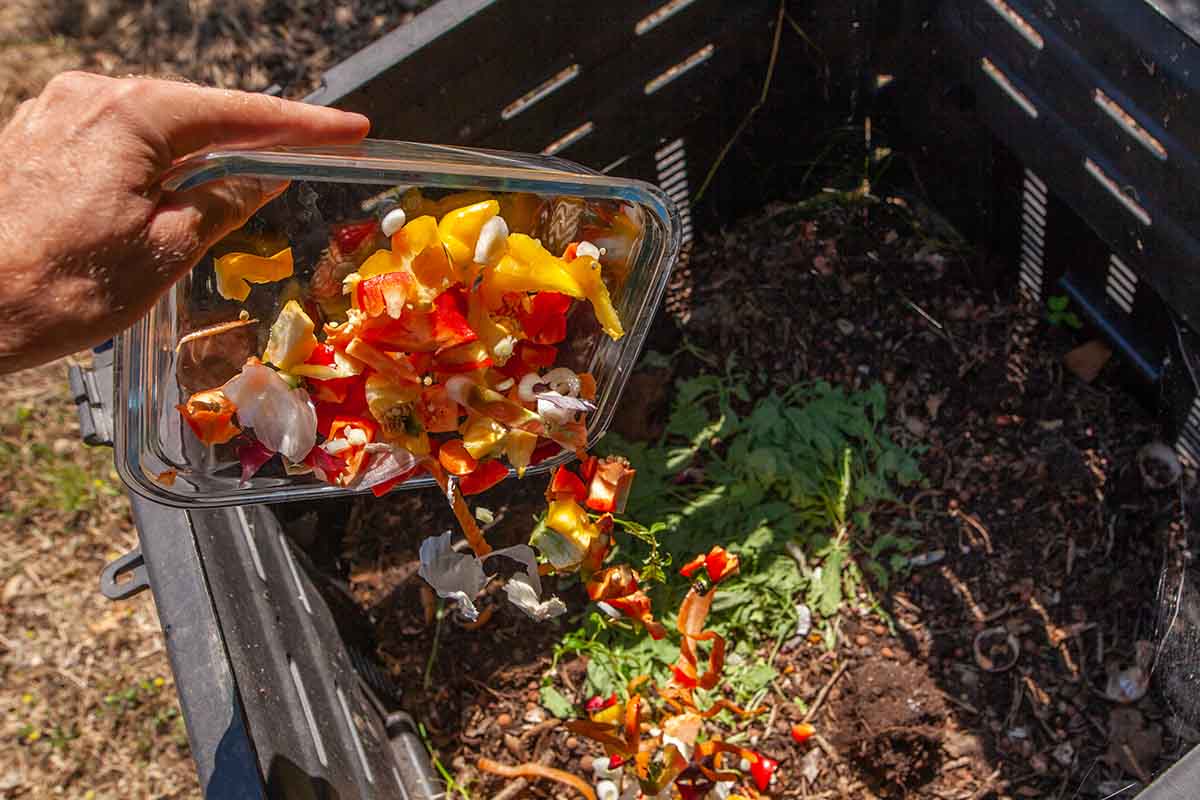 A large outdoor composting bin