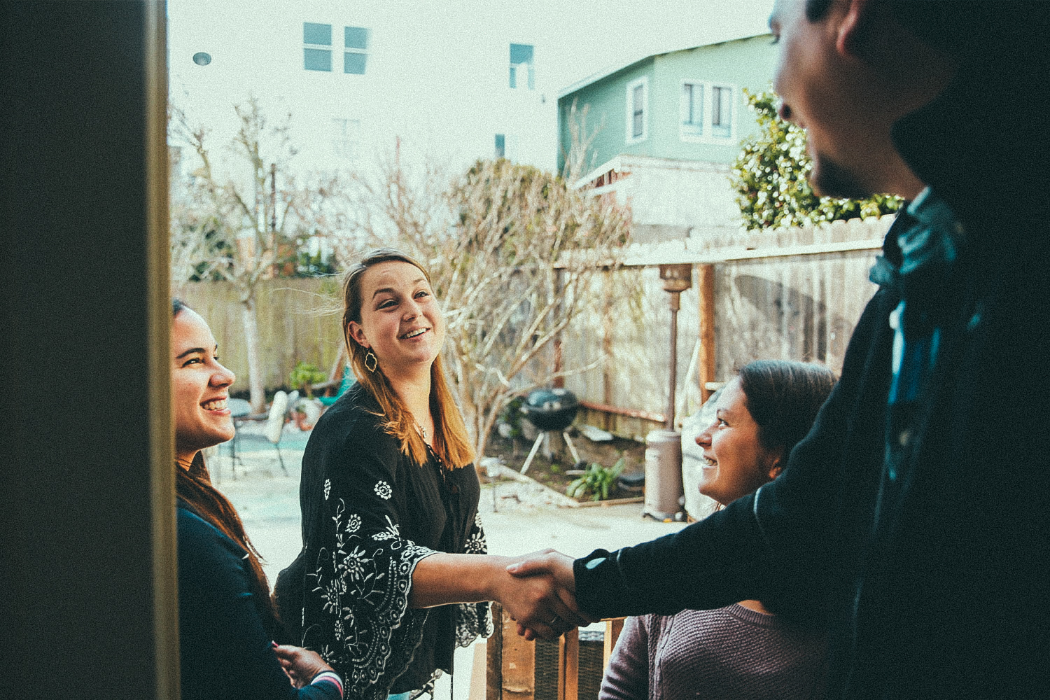 Airbnb host greets new guests at his residence in San Francisco