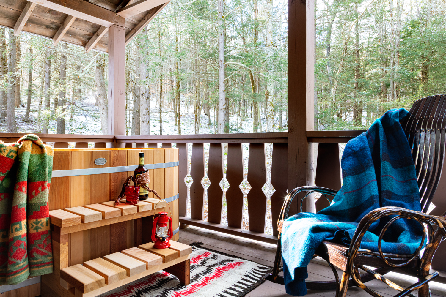 You can enjoy your beverage of choice in a hot tub with a view