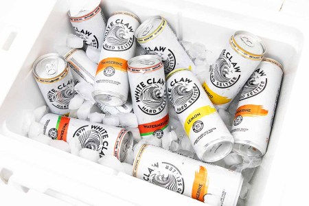 The different flavors of White Claw hard seltzer in a cooler