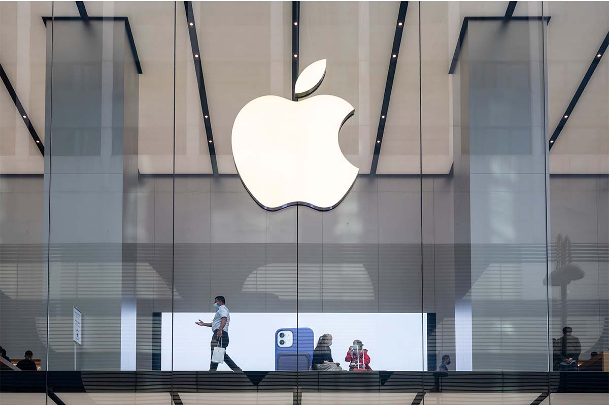 Customers are seen at the American multinational technology company Apple store in Hong Kong