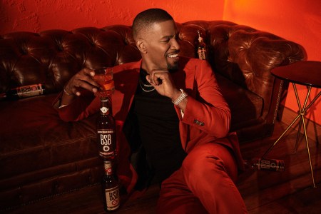 Jamie Foxx with a bottle of BSB-Brown Sugar Bourbon, the whiskey brand he just bought