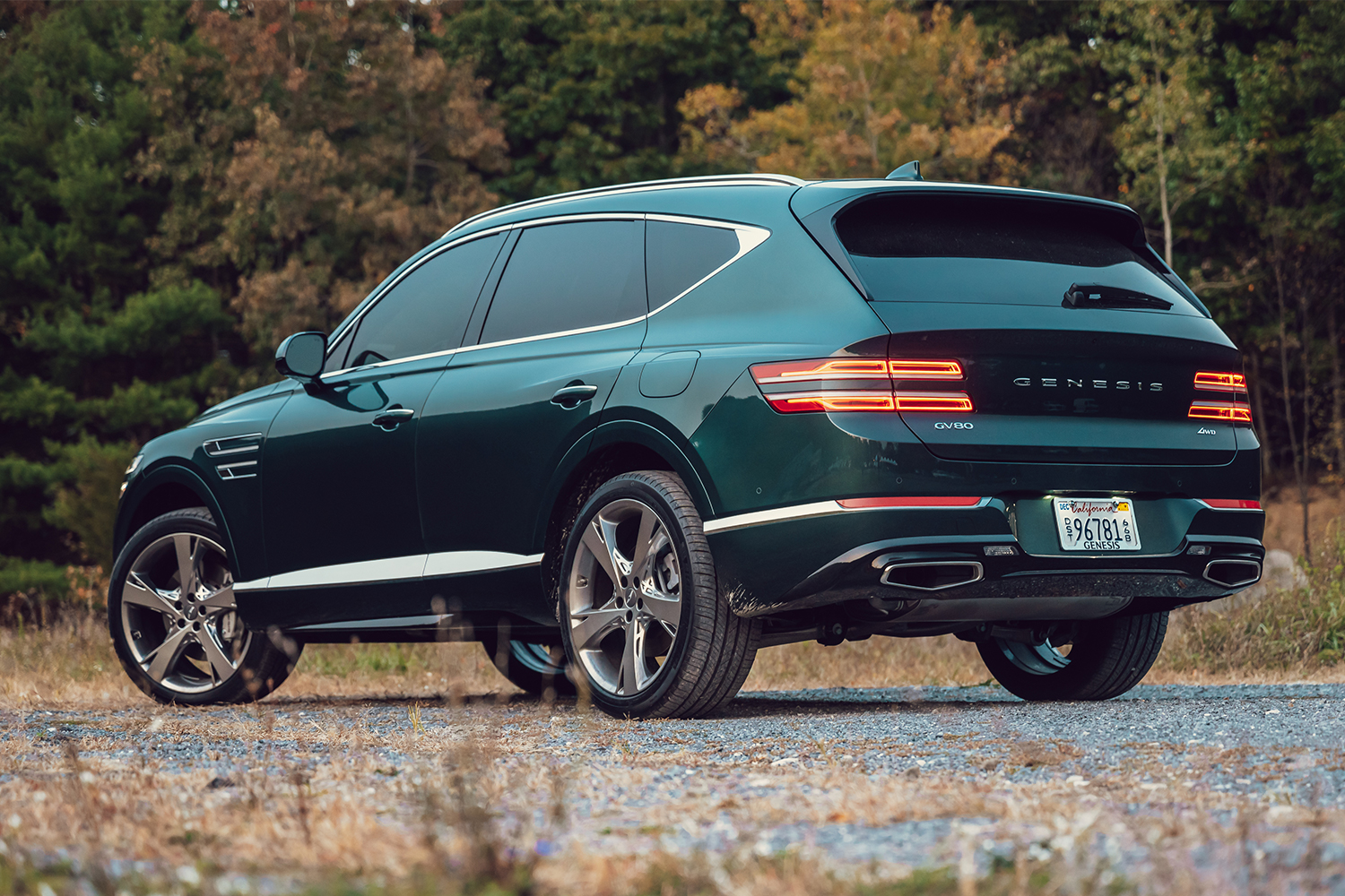 The back end of the 2021 Genesis GV80 SUV in green