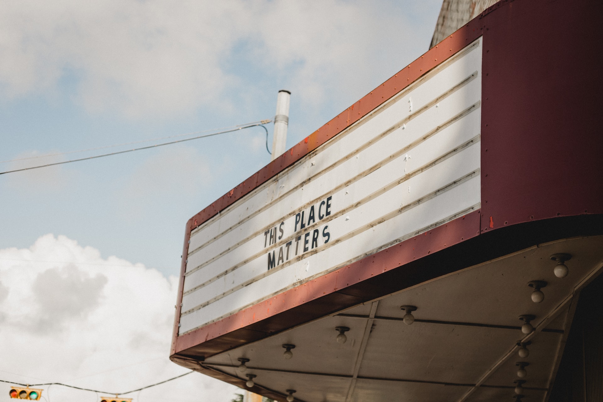 Theater awning with letters that read "This place matters"