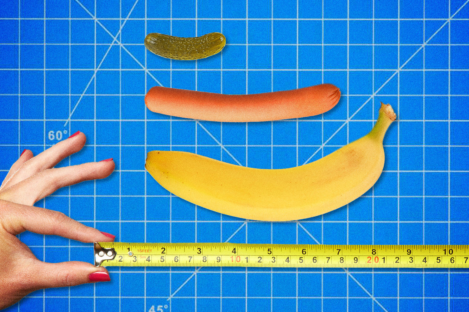 Measuring tape, banana, hot dog and pickle