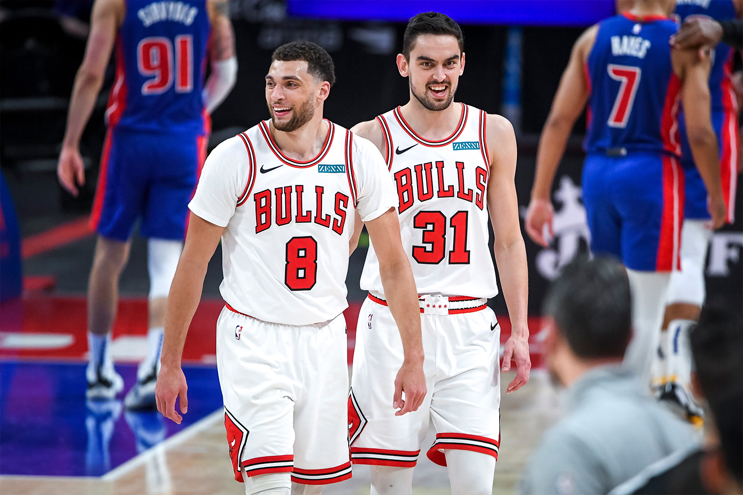 Zach LaVine #8 and Tomas Satoransky #31 of the Chicago Bulls smile during the fourth quarter of the NBA game against the Detroit Pistons 