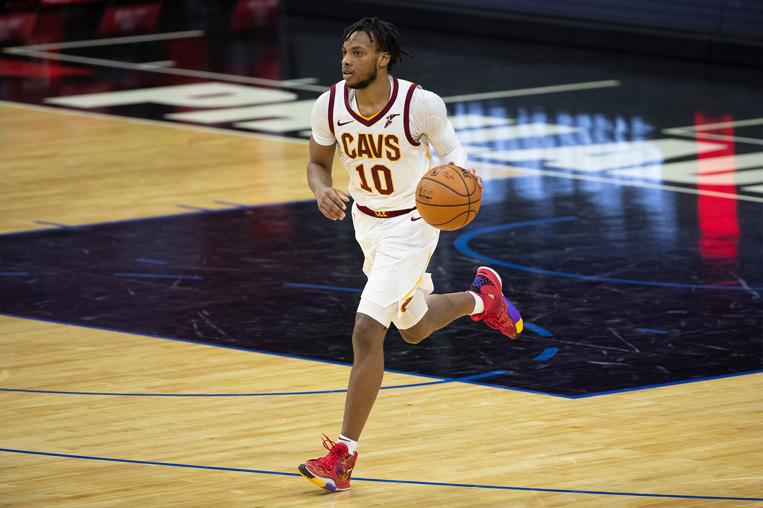 Darius Garland #10 of the Cleveland Cavaliers dribbles the ball against the Philadelphia 76ers 