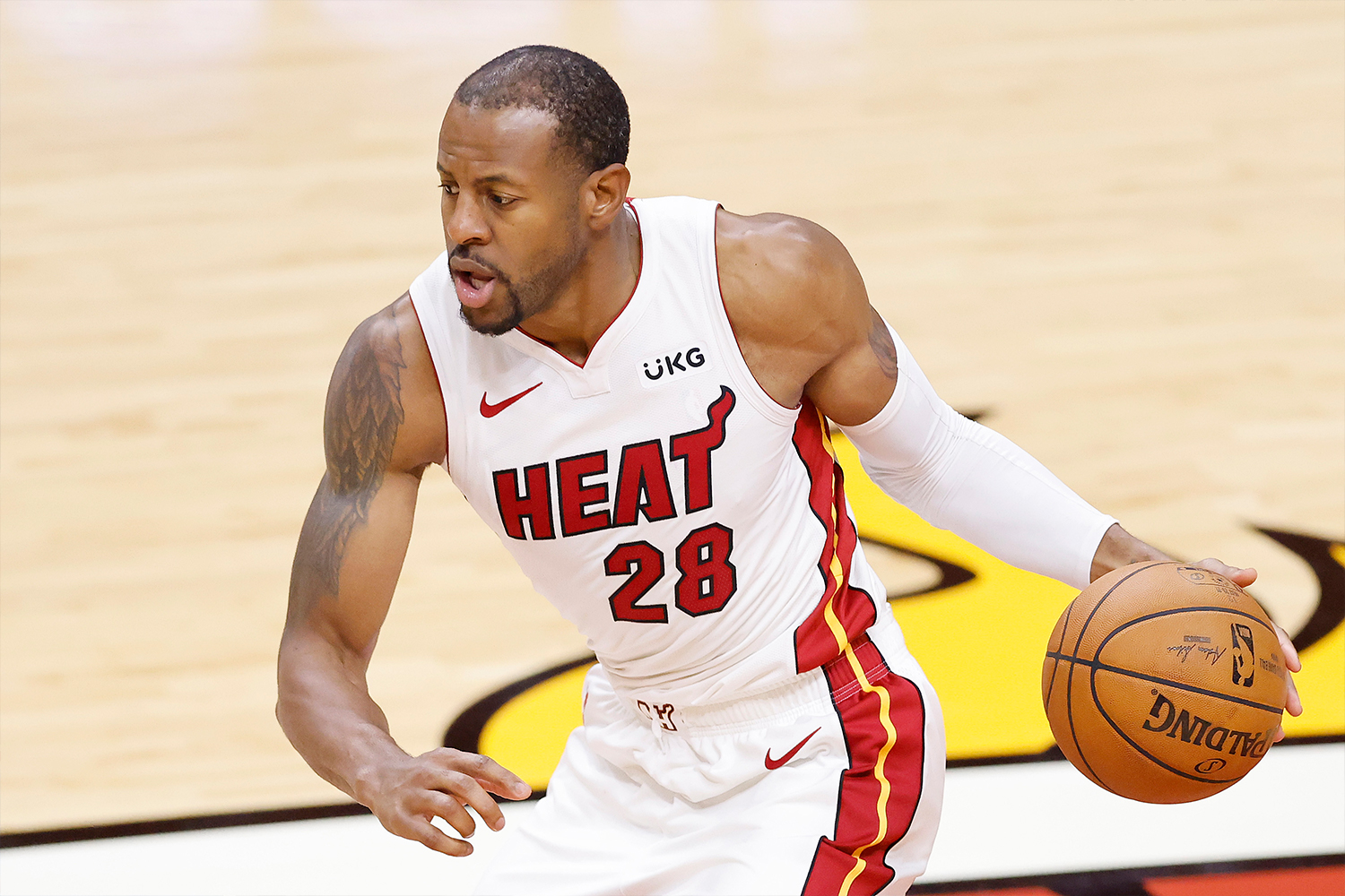 Andre Iguodala #28 of the Miami Heat dribbles against the Milwaukee Bucks 