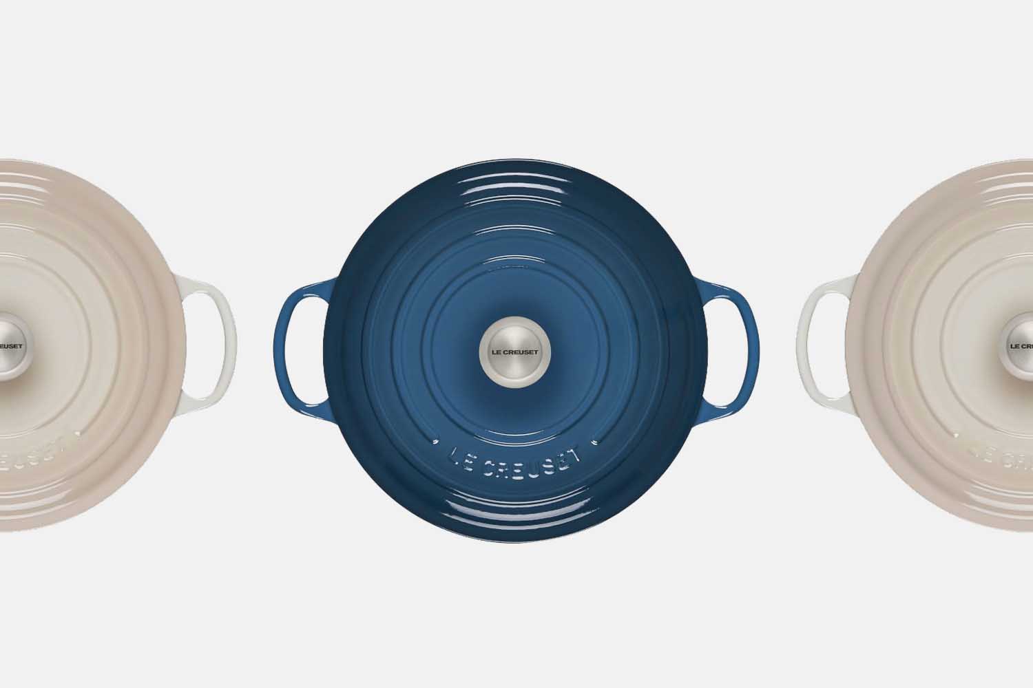 Le Creuset's round wide dutch oven shot from overhead in blue and white