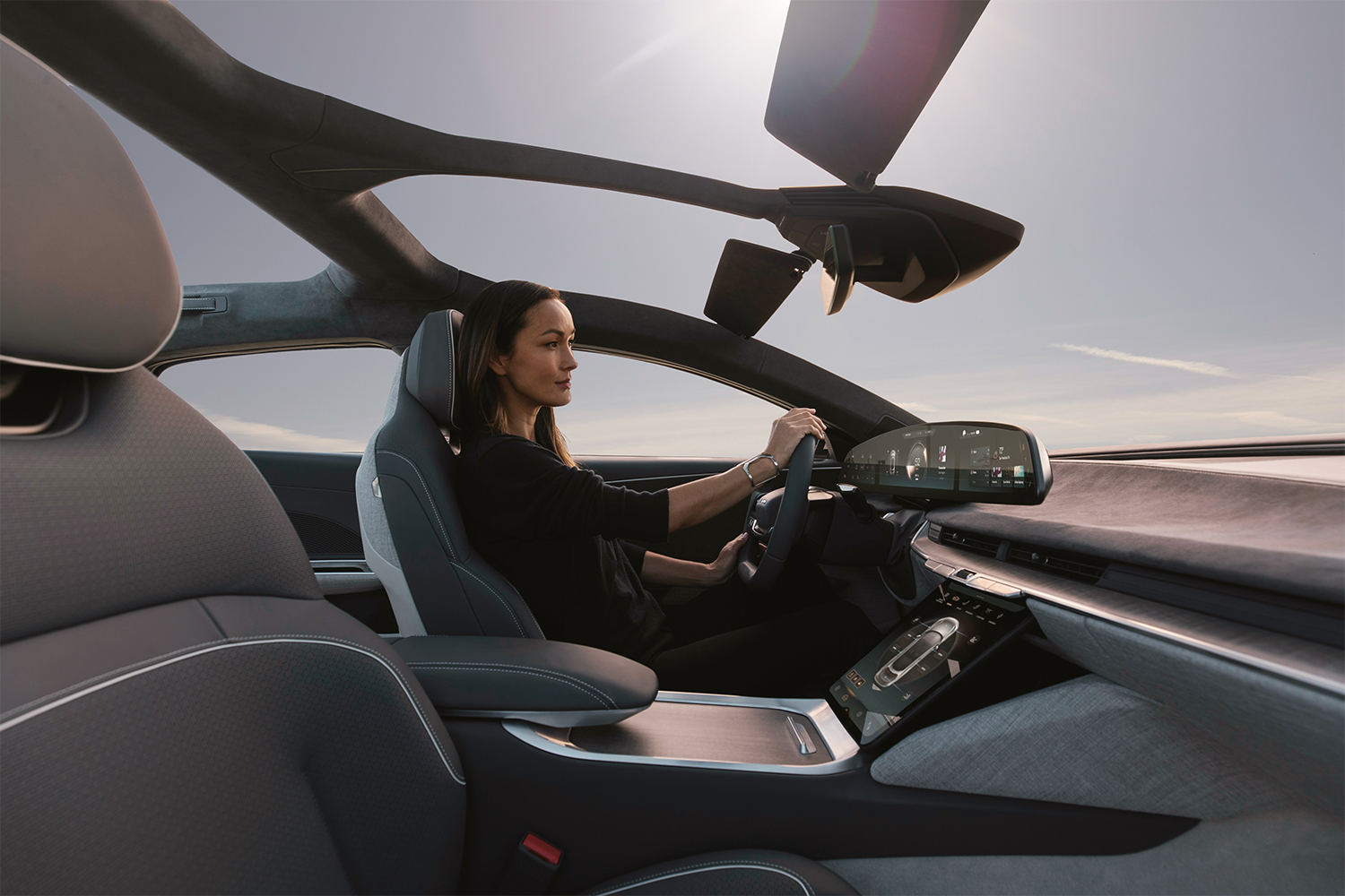 A woman driving the electric Lucid Air sedan 