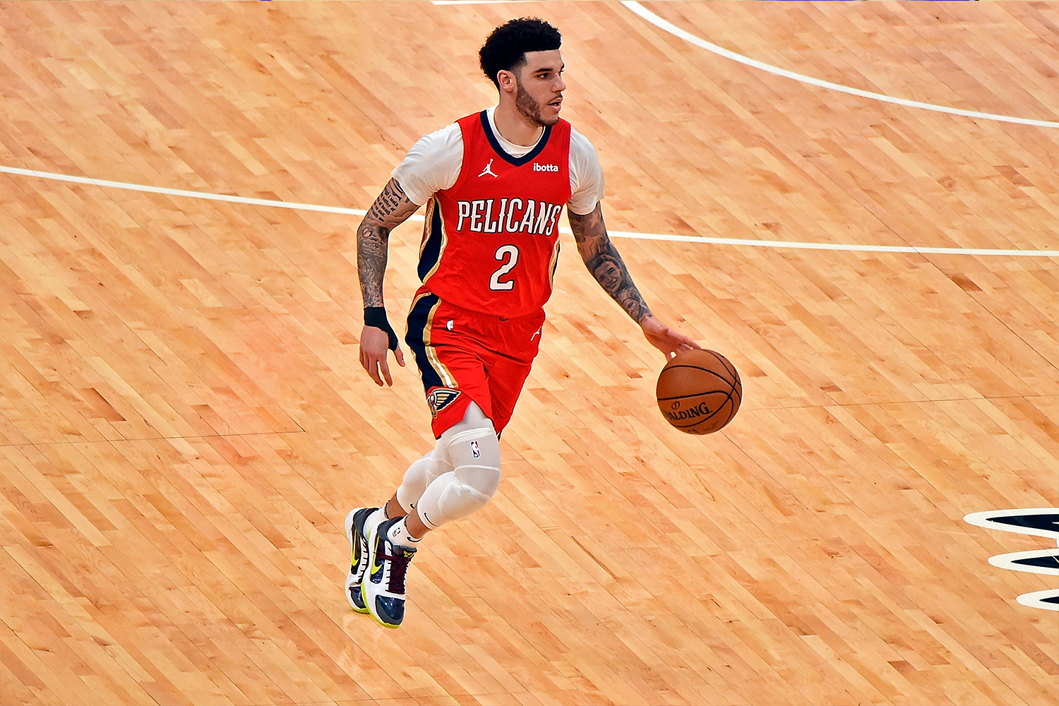 Lonzo Ball #2 of the New Orleans Pelicans brings the ball up court during the second half against the Memphis Grizzlies