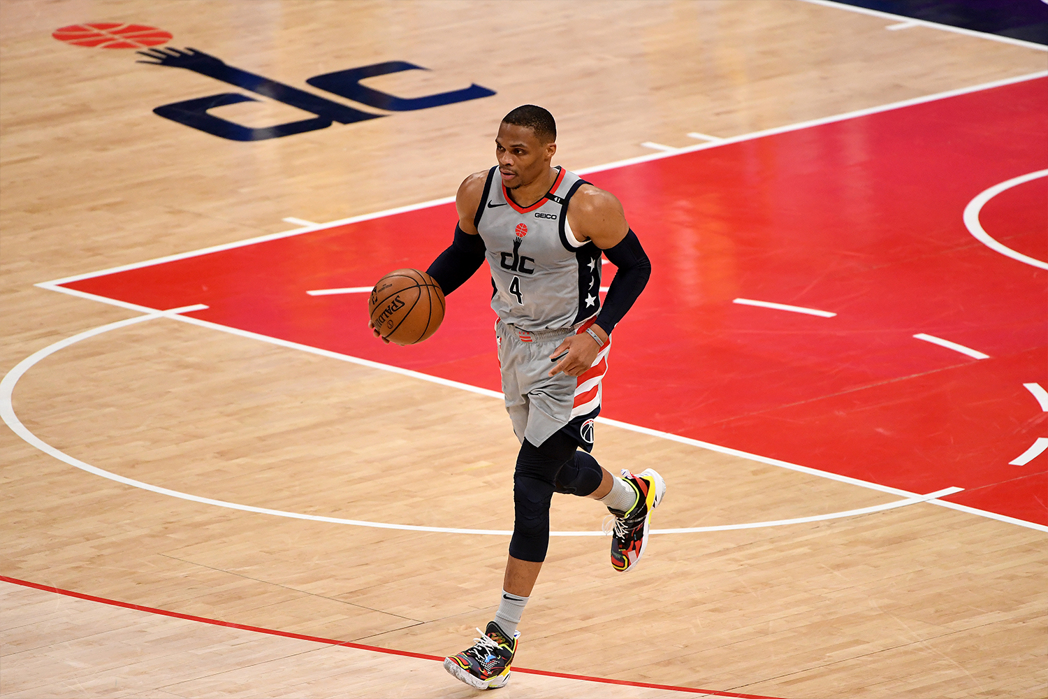 Russell Westbrook #4 of the Washington Wizards dribbles against the Golden State Warriors