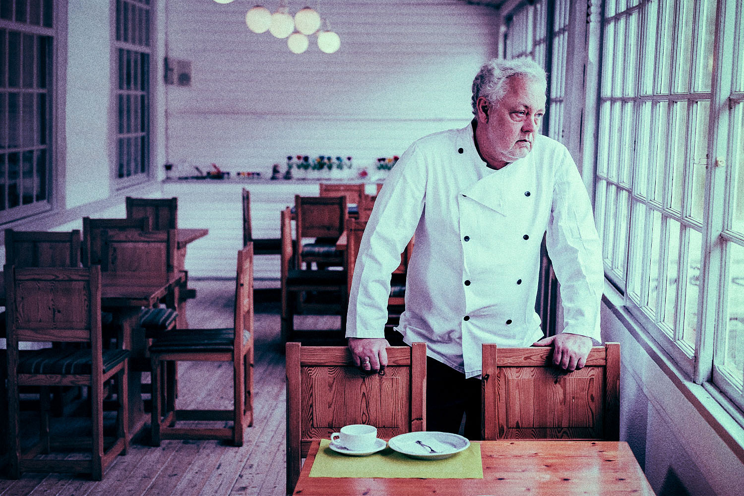 A chef looks out within an empty restaurant. Hospitality staffing remains an issue during the latter stage of the Covid-19 pandemic.