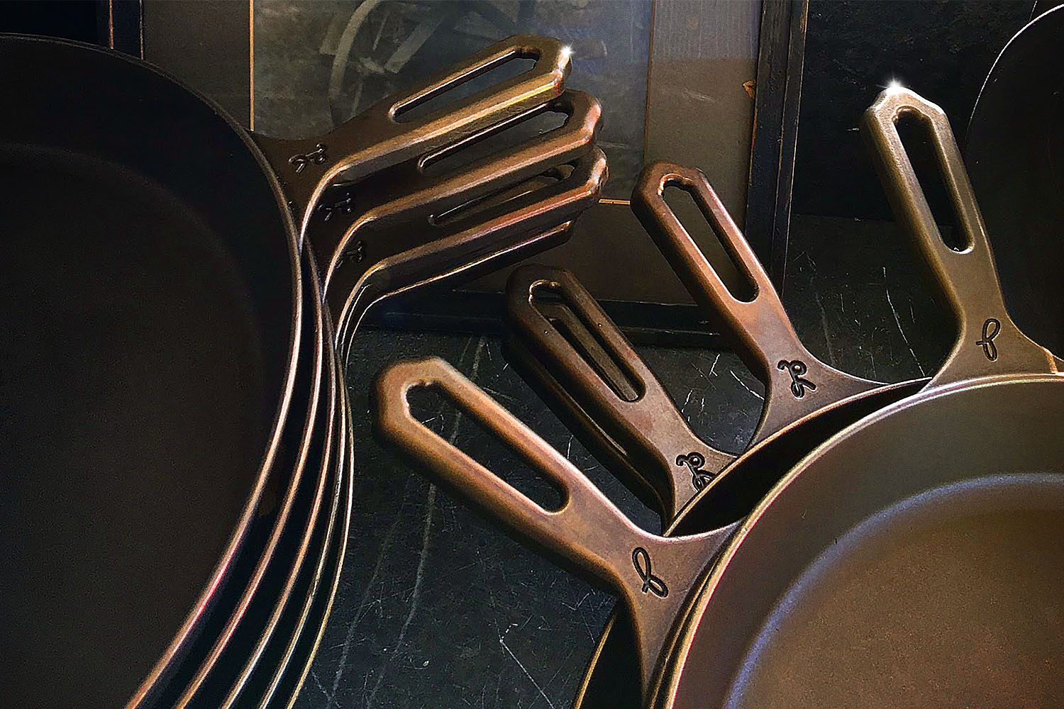 Cast-iron pans from Butter Pat stacked on top of each other