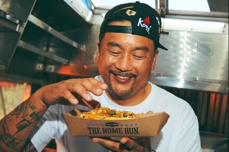 Roy Choi stares with glee at the Kogi Dog.