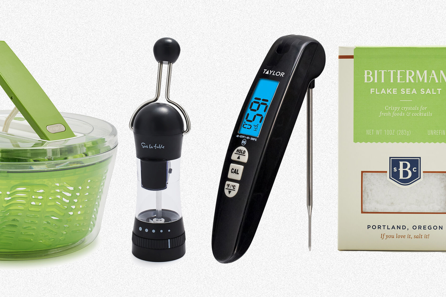 A salad spinner, ratchet mill, meat thermometer and salt from Sur La Table