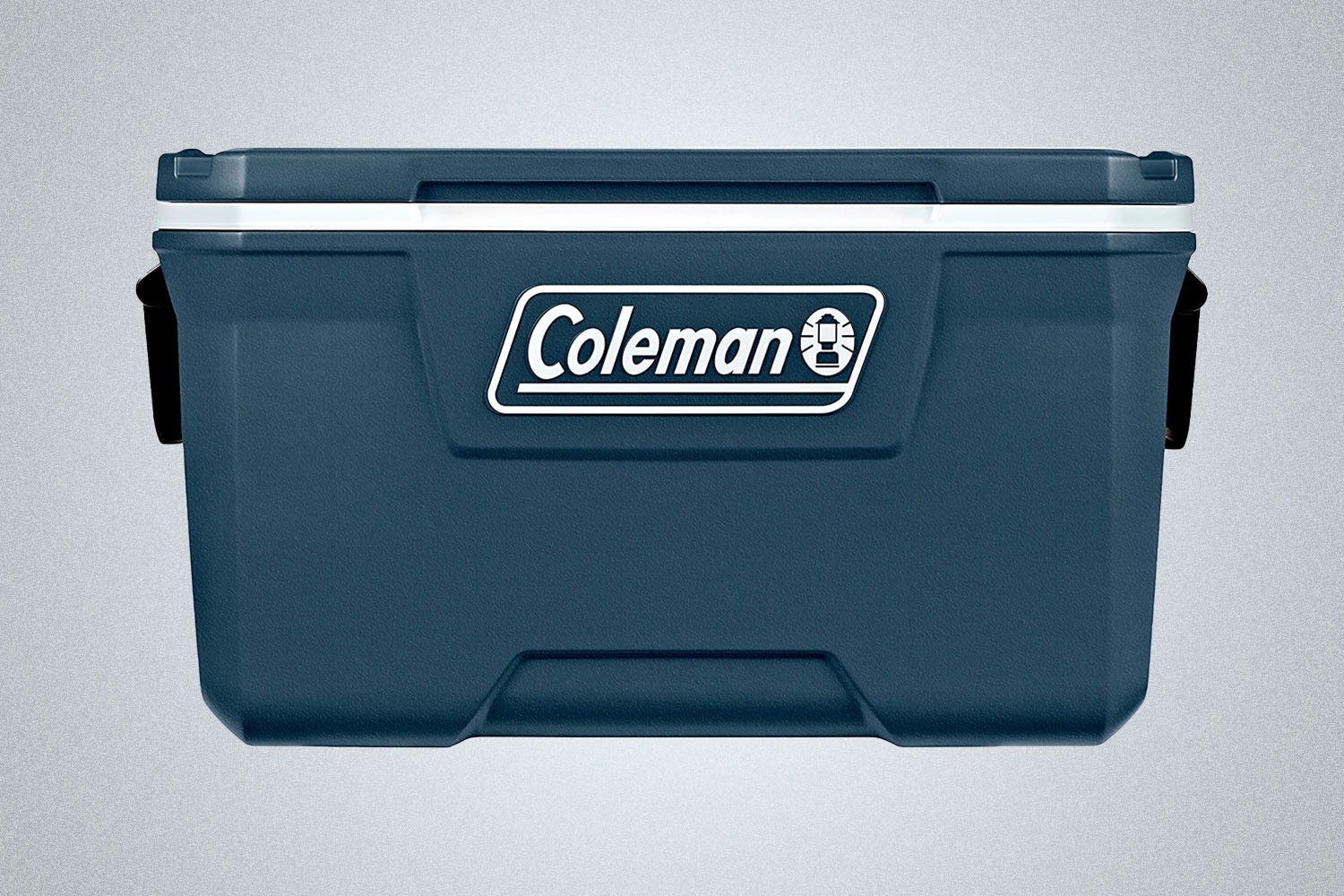 a 70 QRT Coleman blue cooler  on a grey background 