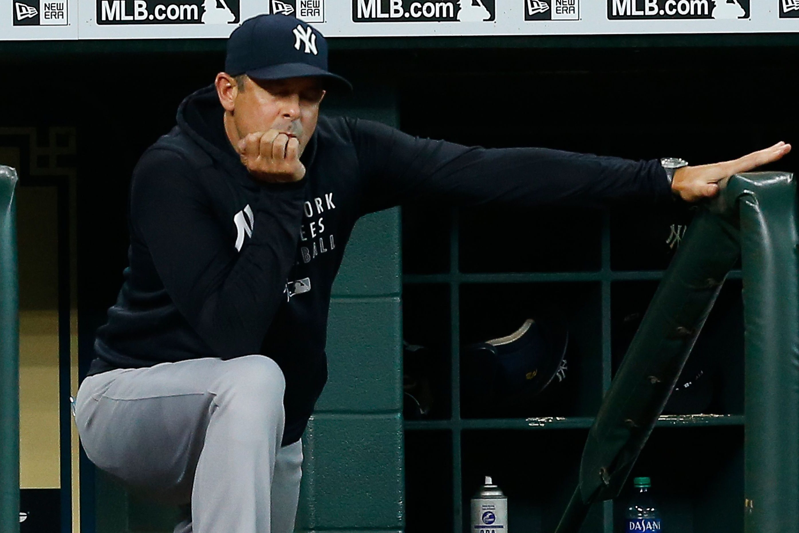 Manager Aaron Boone of the New York Yankees looks on from the dugout. 