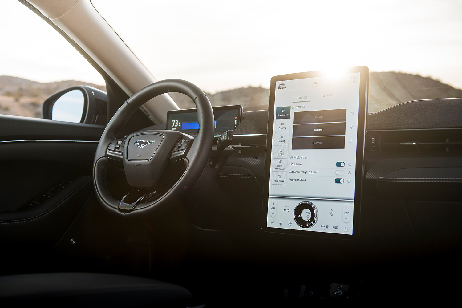 The touchscreen inside the Ford Mustang Mach-E on the dash next to the steering wheel