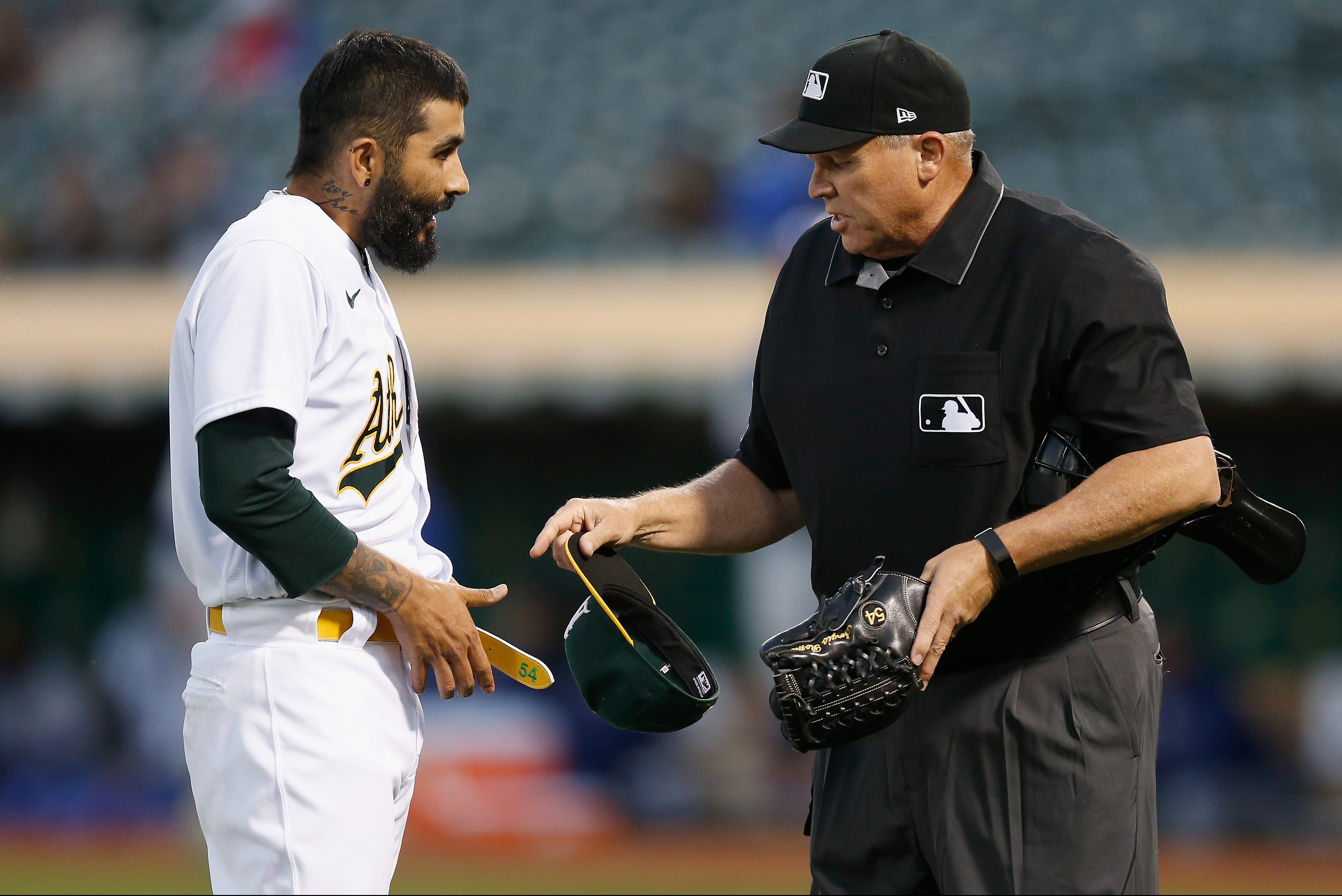 Sergio Romo is inspected for foreign substances