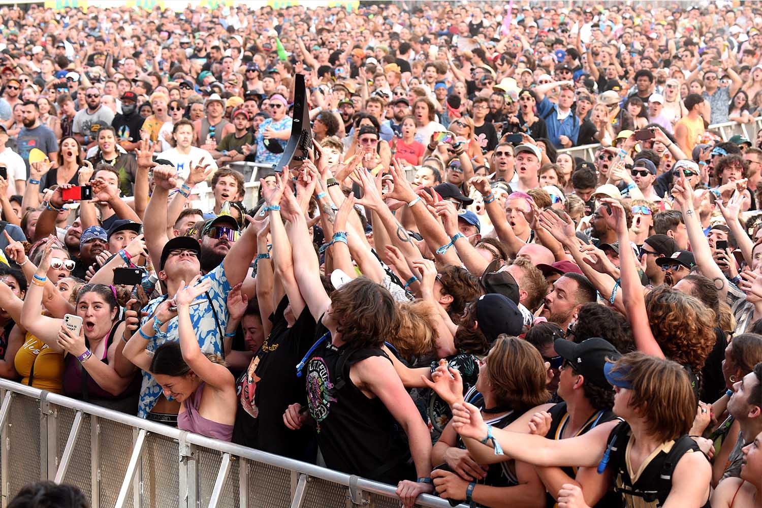 CHICAGO, ILLINOIS - JULY 31: Crowd catches Wes Borland's guitar during Lollapalooza 2021 at Grant Park on July 31, 2021 in Chicago, Illinois. 
