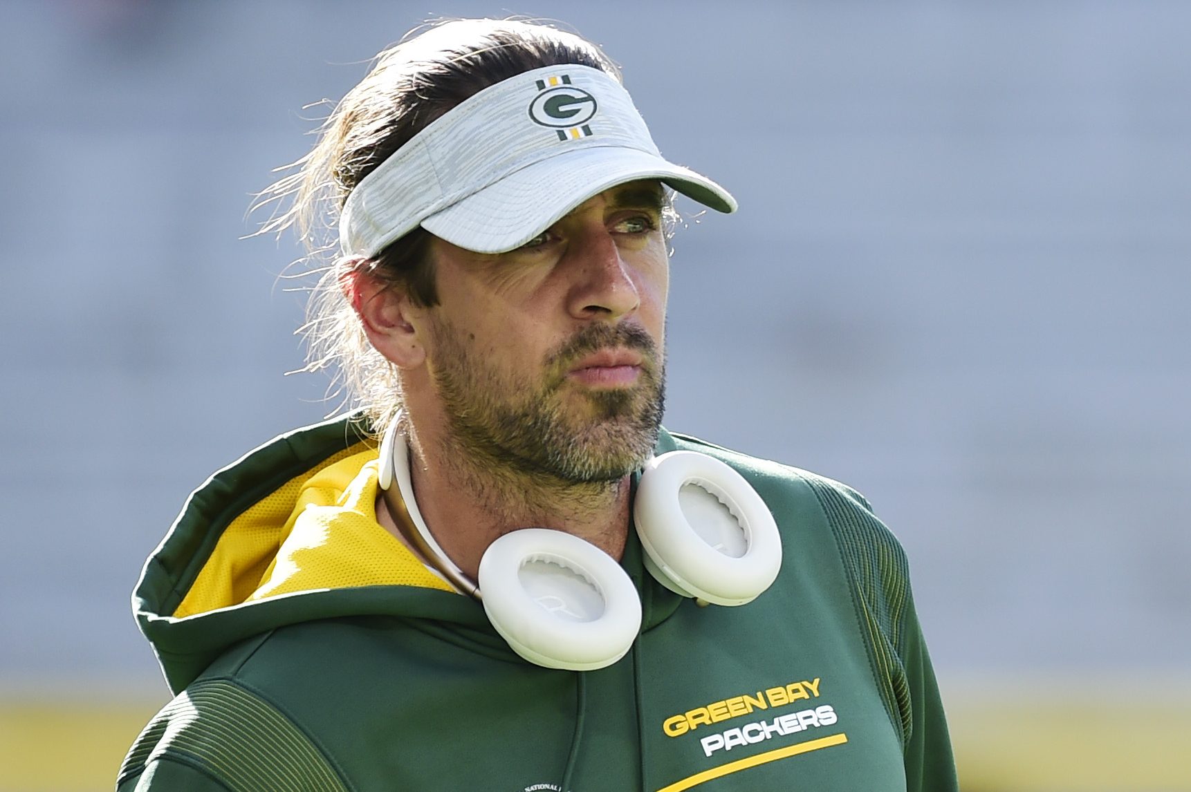 Green Bay Packers quarterback Aaron Rodgers looks on during warmups. The NFL MVP is back in the running for the host of Jeopardy!