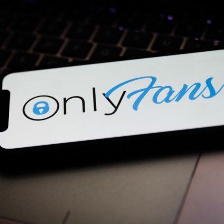 OnlyFans logo displayed on iPhone screen