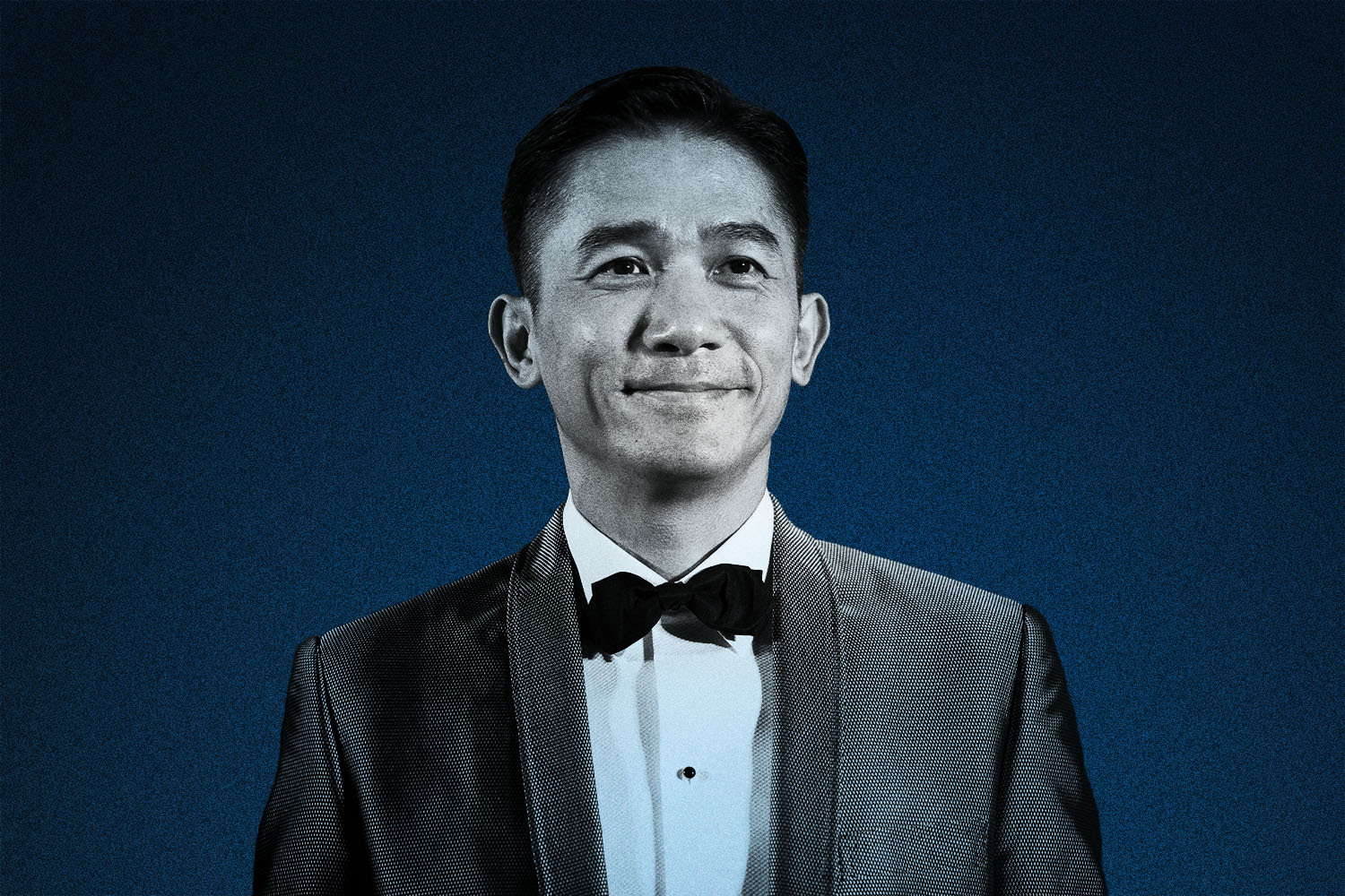 hong kong actor tony leung chiu-wai wears a black suit and bow tie