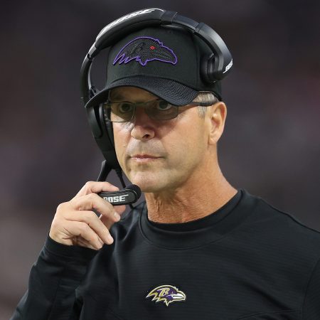 Head coach John Harbaugh of the Baltimore Ravens watches a game. Thanks to Harbaugh's fourth-down call, the Ravens finally beat the Chiefs.